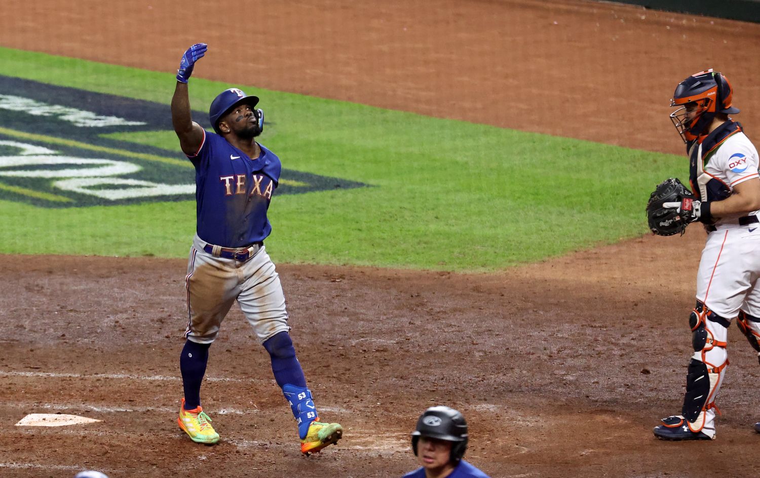 Texas Rangers right fielder Adolis Garcia celebrates after hitting a home run during the eighth inning of Game 7 of the ALCS against the Houston Astros on Oct. 23 at Minute Maid Park.